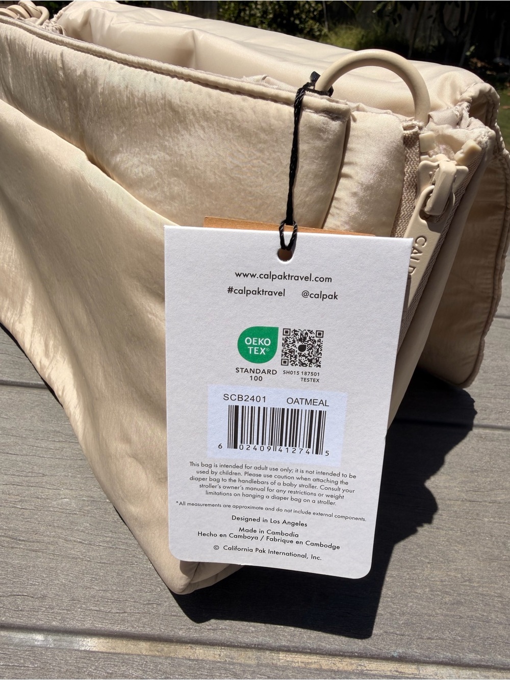 Calpak Convertible Stroller Caddy Crossbody in Oatmeal - Picture 7 of 10